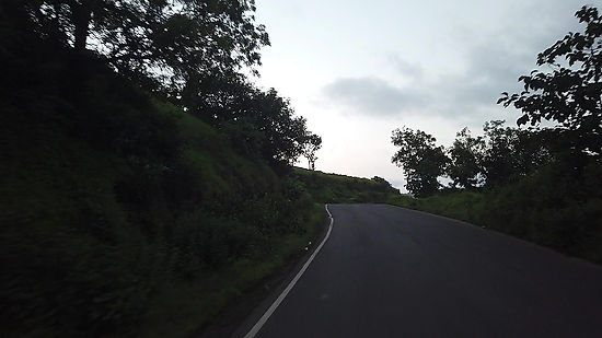 Traveling by CAR on Hilly Curvy Road to the Bhimashankar Mahadev in the Morning at Maharashtra